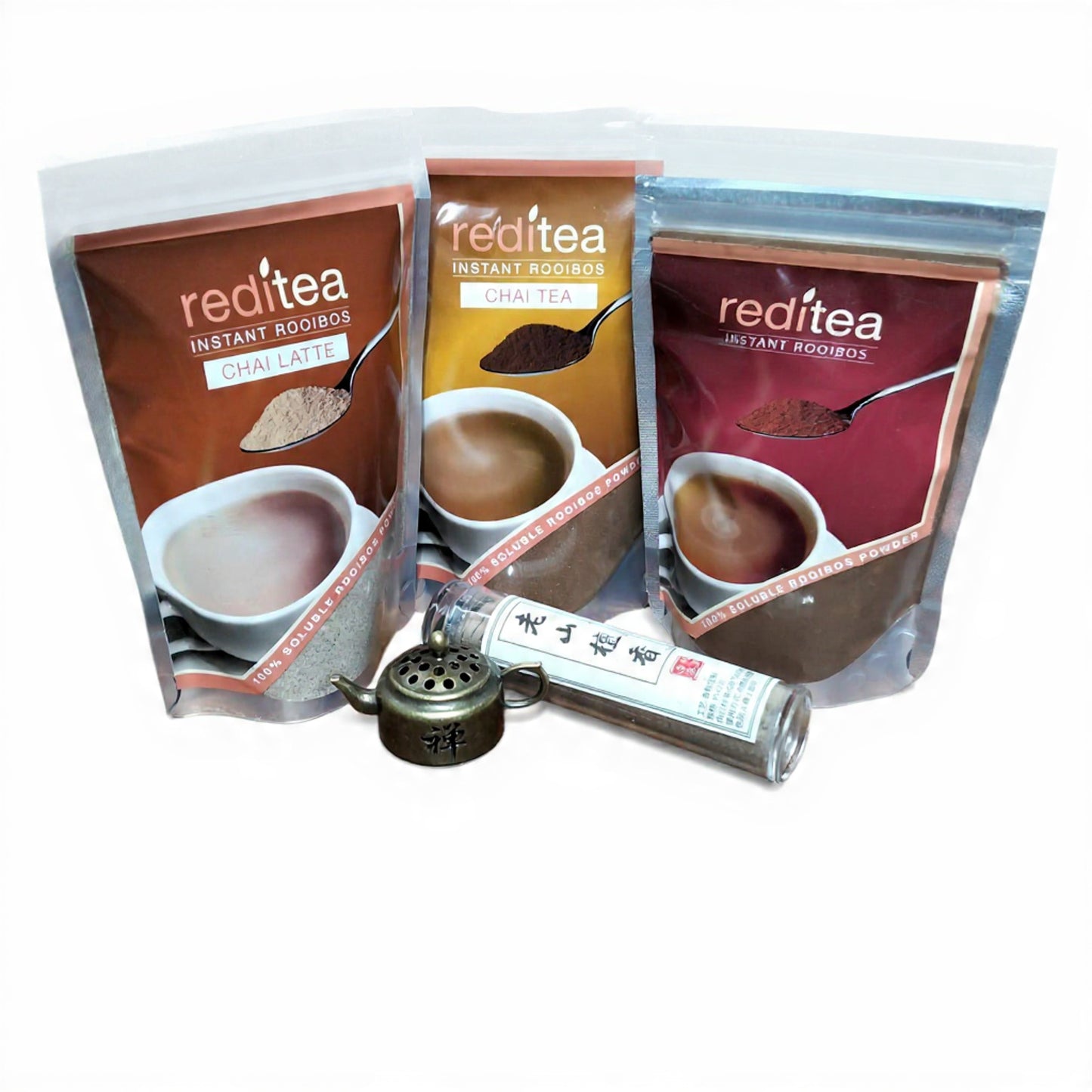 Chai Bundle:  Instant Rooibos Chai Latte (x2), Chai Tea, and Classic Rooibos powder pack. Perfect for cozy moments or gifting with the included mini teapot incense burner and a full tube of 40 agar wood incense coils.
2 x Chai Latte (120g) and 1x Chai Tea (80g), reditea Instant Rooibos (65g)